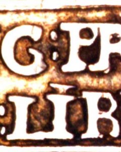 Detail of Double Punching in the Inscription