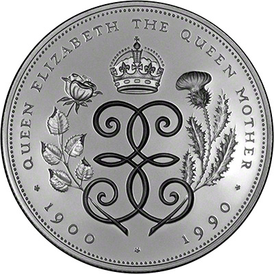 Reverse of 1990 Crown Featuring a crowned double E monogram, with roese and thistle