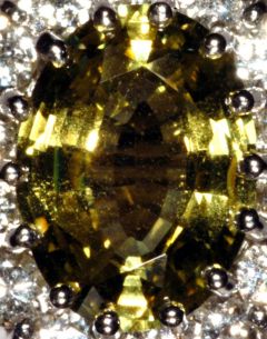 Large Oval Chrysoberyl Mounted in Cluster RIng