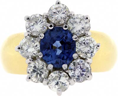 Oval Sapphire and Diamond Cluster on a Domed Band