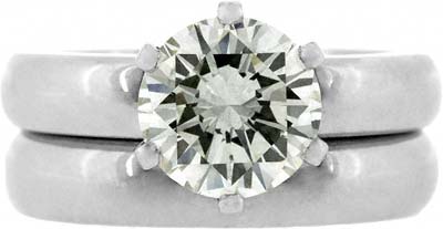 Diamond Solitaire Ring with Platinum Wedding Ring