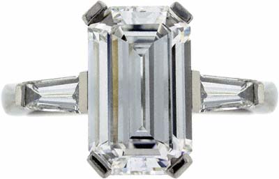 Emerald Cut Solitaire with Tapered Baguette Shoulder Stones in Platinum