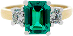Emerald Cut Three Stone Emerald and Diamond Ring